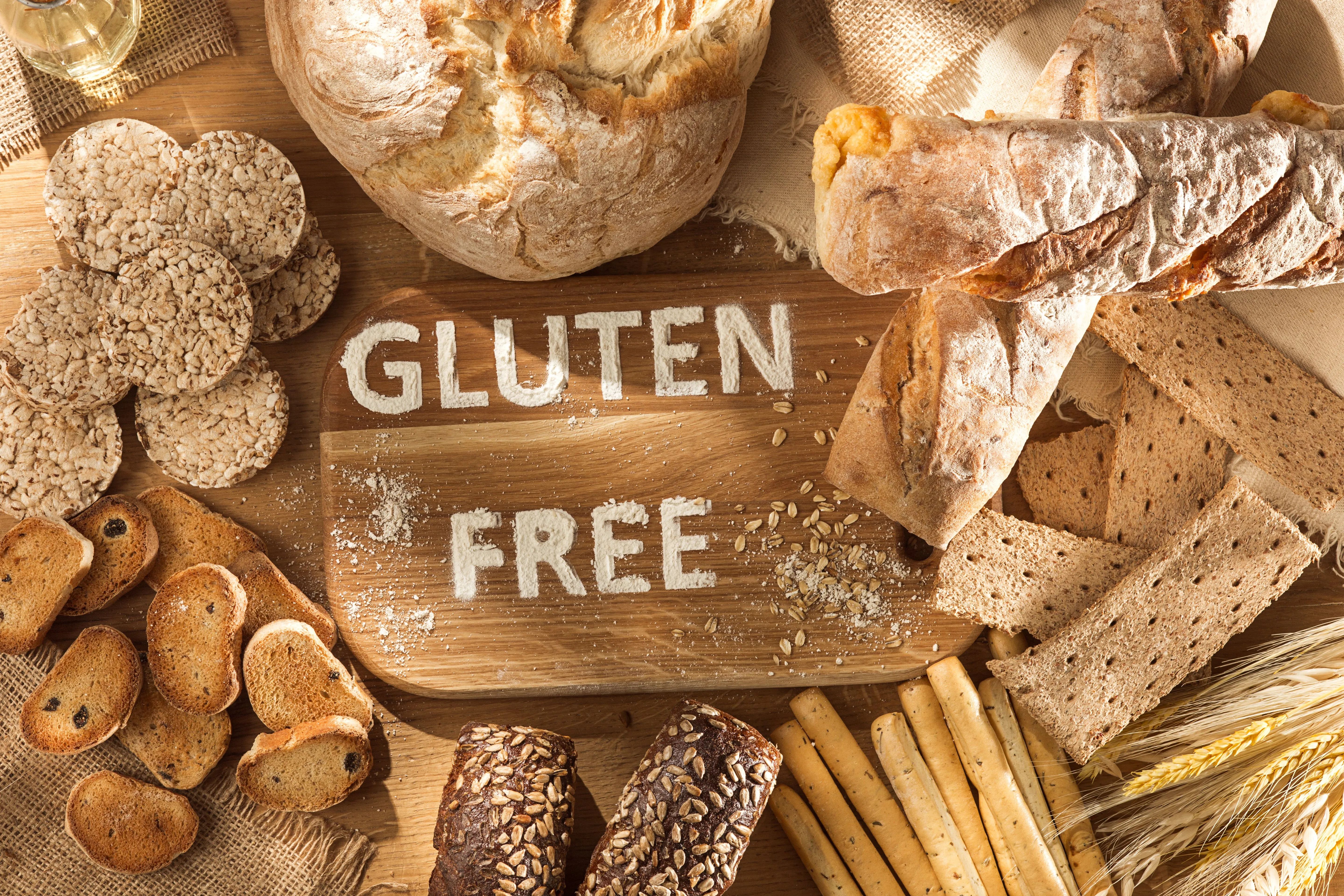 Gluten free food. Various pasta, bread and snacks on wooden background from top view Gluten free food. Various pasta, bread and snacks on wooden background from top view. Healthy and diet concept.